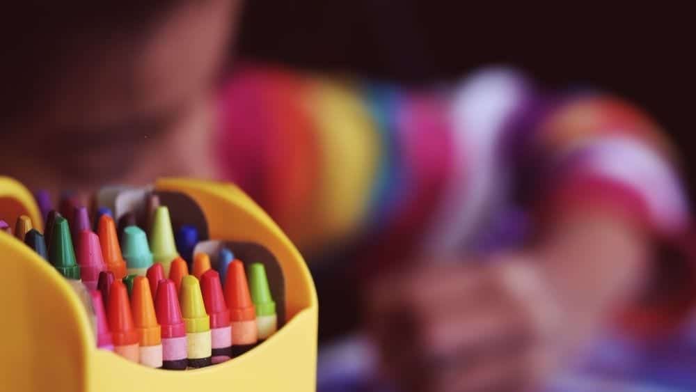 schools child with crayons