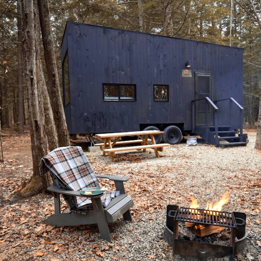 Photo by Andrea Davis on Unsplash tiny house in forest
