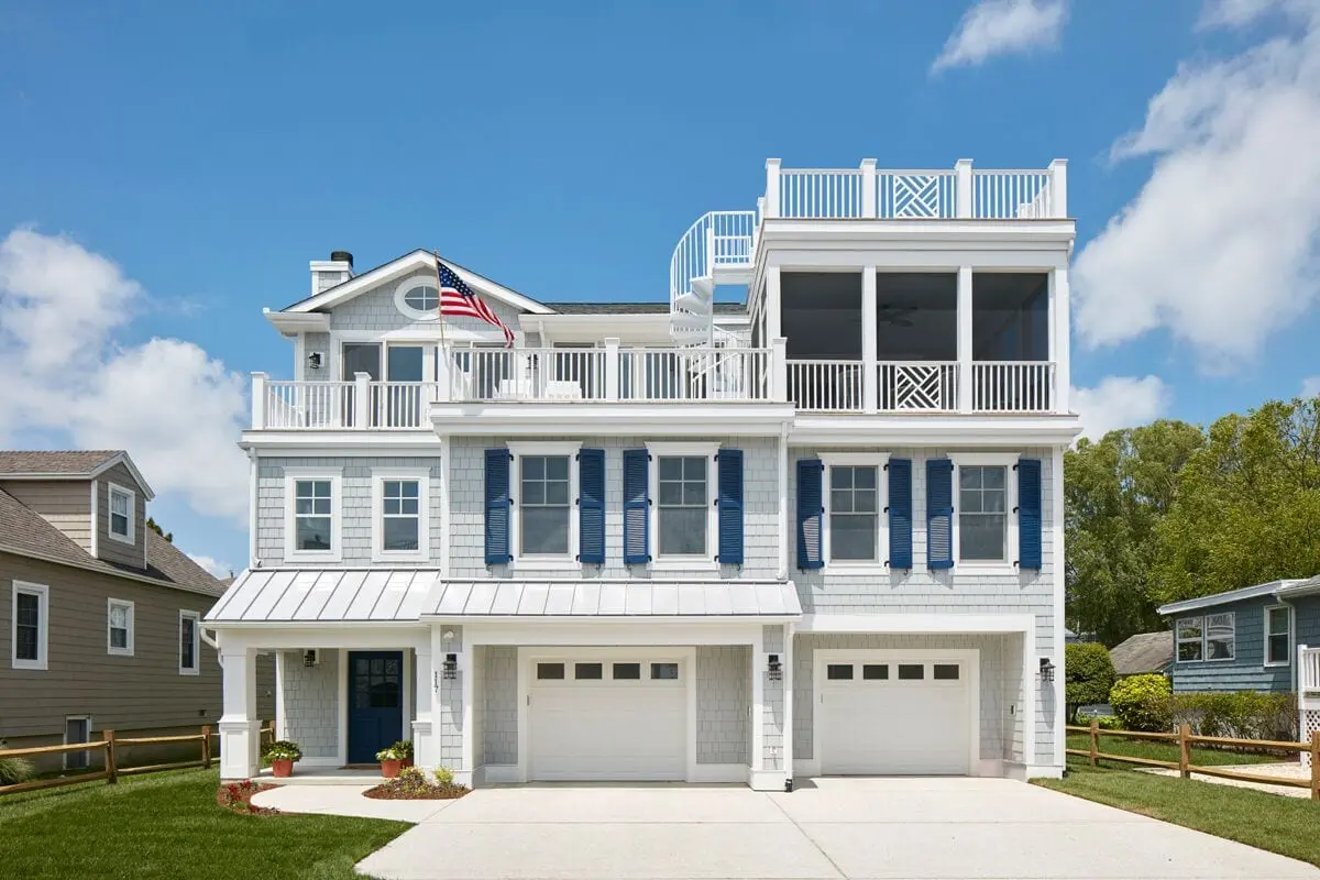 Beautiful coastal colonial home with NuCedar and Hardieplank exterior.