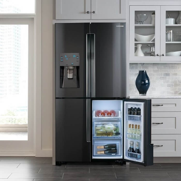 Black stainless steel fridge with opened beverage compartment