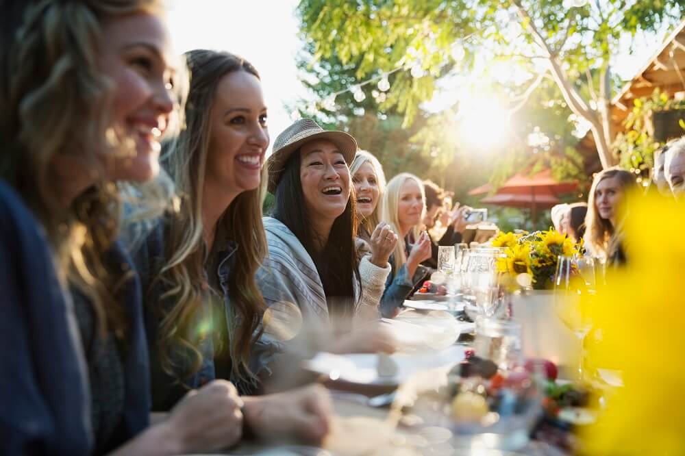 Friends enjoying outdoor dinner party