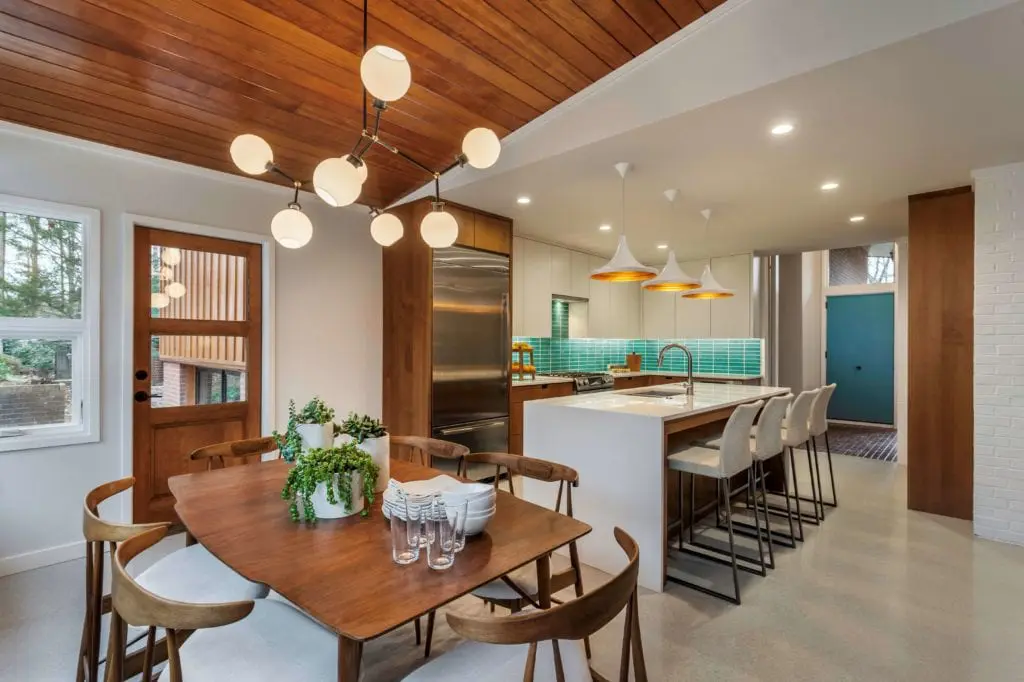 A modern kitchen and dining space in townhouse