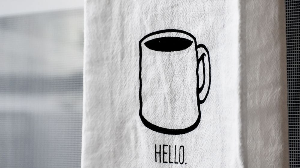 Dish towel with coffee mug