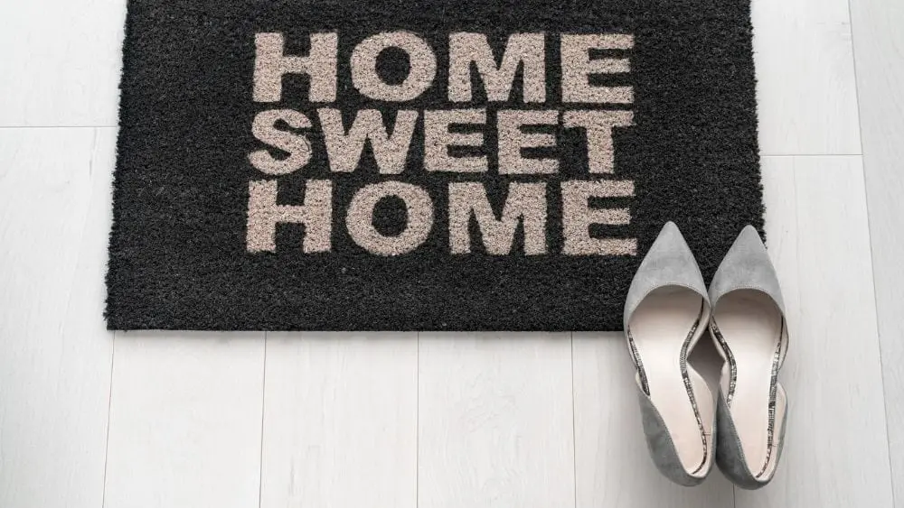 welcome mat with fancy shoes