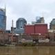 View of Nashville skyline from river with famous "Batman" building on the left