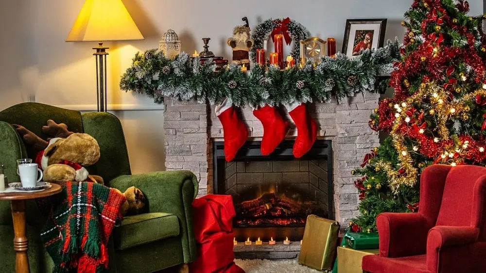 Living room with fireplace decorated with Christmas decor.