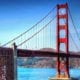 View of Golden Gate Bridge against a clear blue sky.