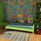 Child's room with wallpaper featuring woodland creatures on a light blue background