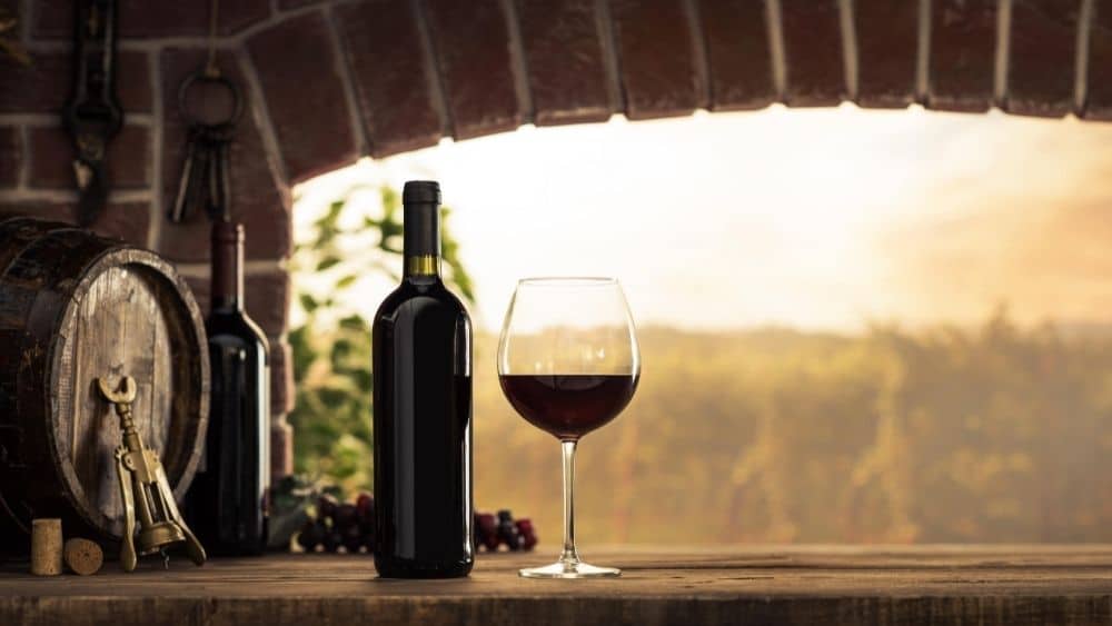 wine bottle overlooking winery