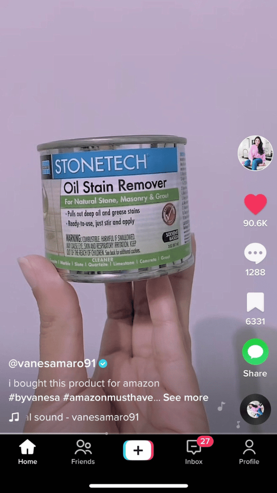 Screenshot of @vanesamora91's TikTok video reviewing Stone Tech oil stain remover.