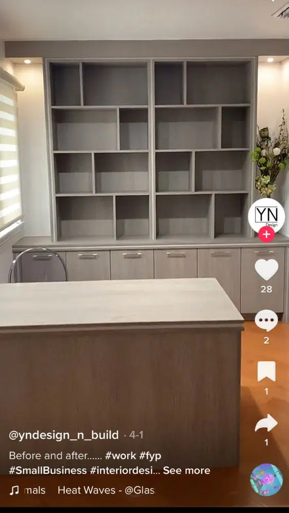 Screenshot of @yndesign_n_build's TikTok video of a built-in shelving unit with recessed lighting.