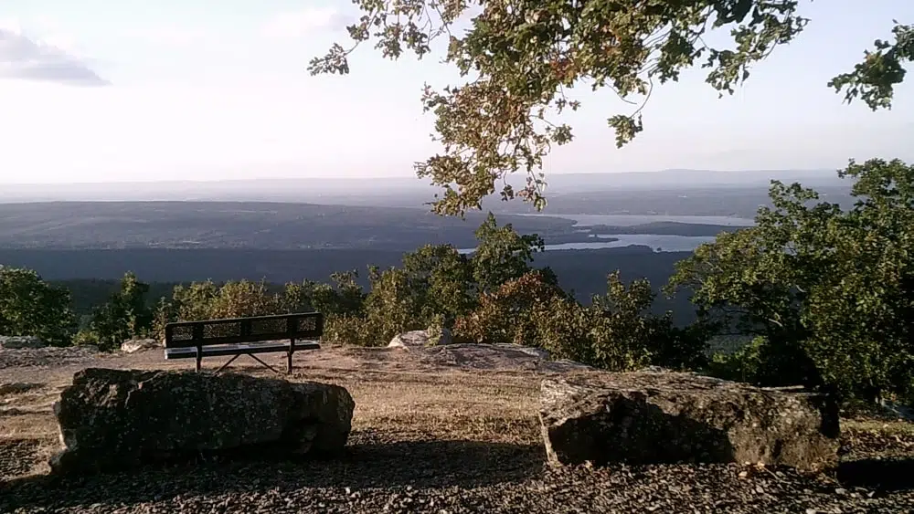 Viewing area with bench at Mount Nebo State Park with Arkansas River Valley below