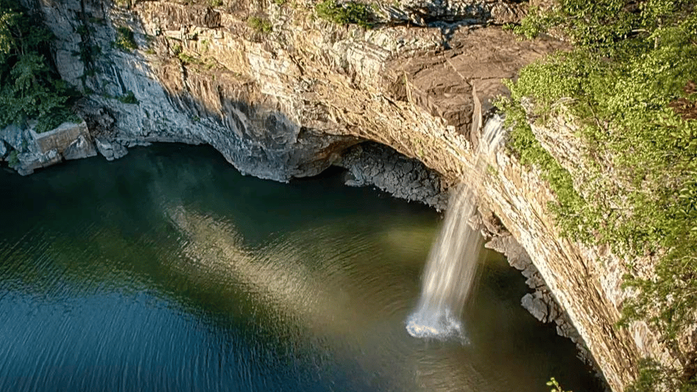 View from above of a flowing waterfall at DeSoto Falls at DeSoto State Park, Alabama.