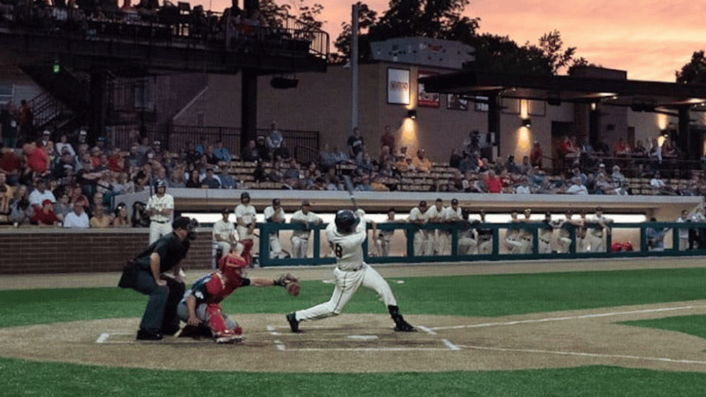 Baseball game at sunset at Loeb Stadium in Lafayette, Indiana.