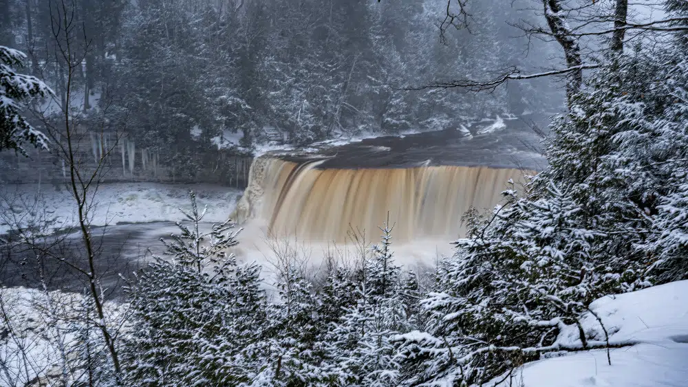 View of a waterfall during winter at Tahquamenon Falls State Park, Michigan.