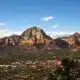 View of Sedona, Arizona, with red rock mountain formations in background