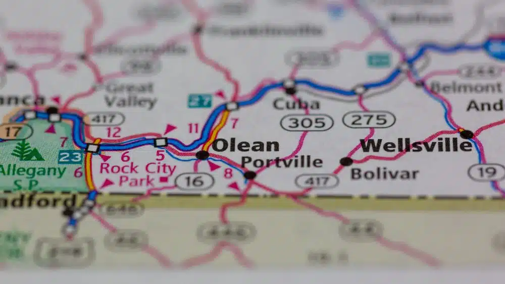 Close up of a map pointing where Olean is.
