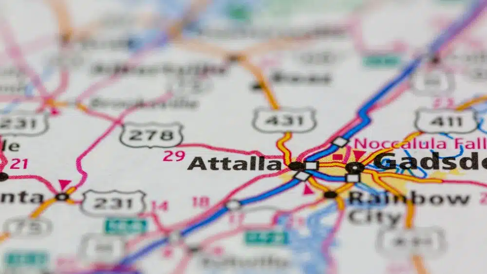 Close-up of a map with roads and interstates. The city of Attalla is marked in the middle.