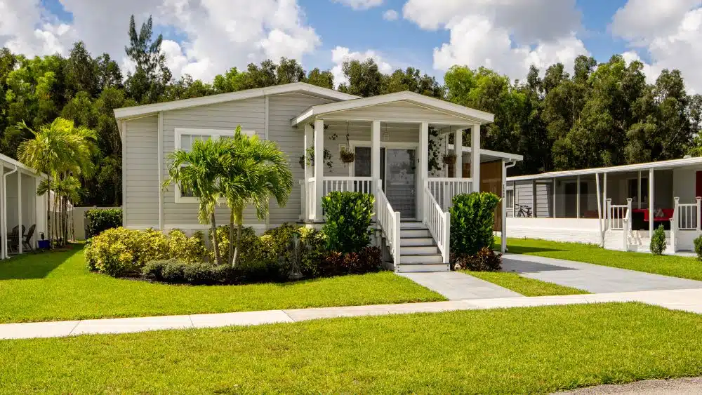 modular or manufactured home with nice landscaping