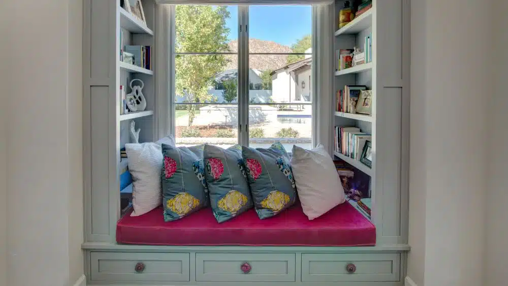 window nook with books and storage